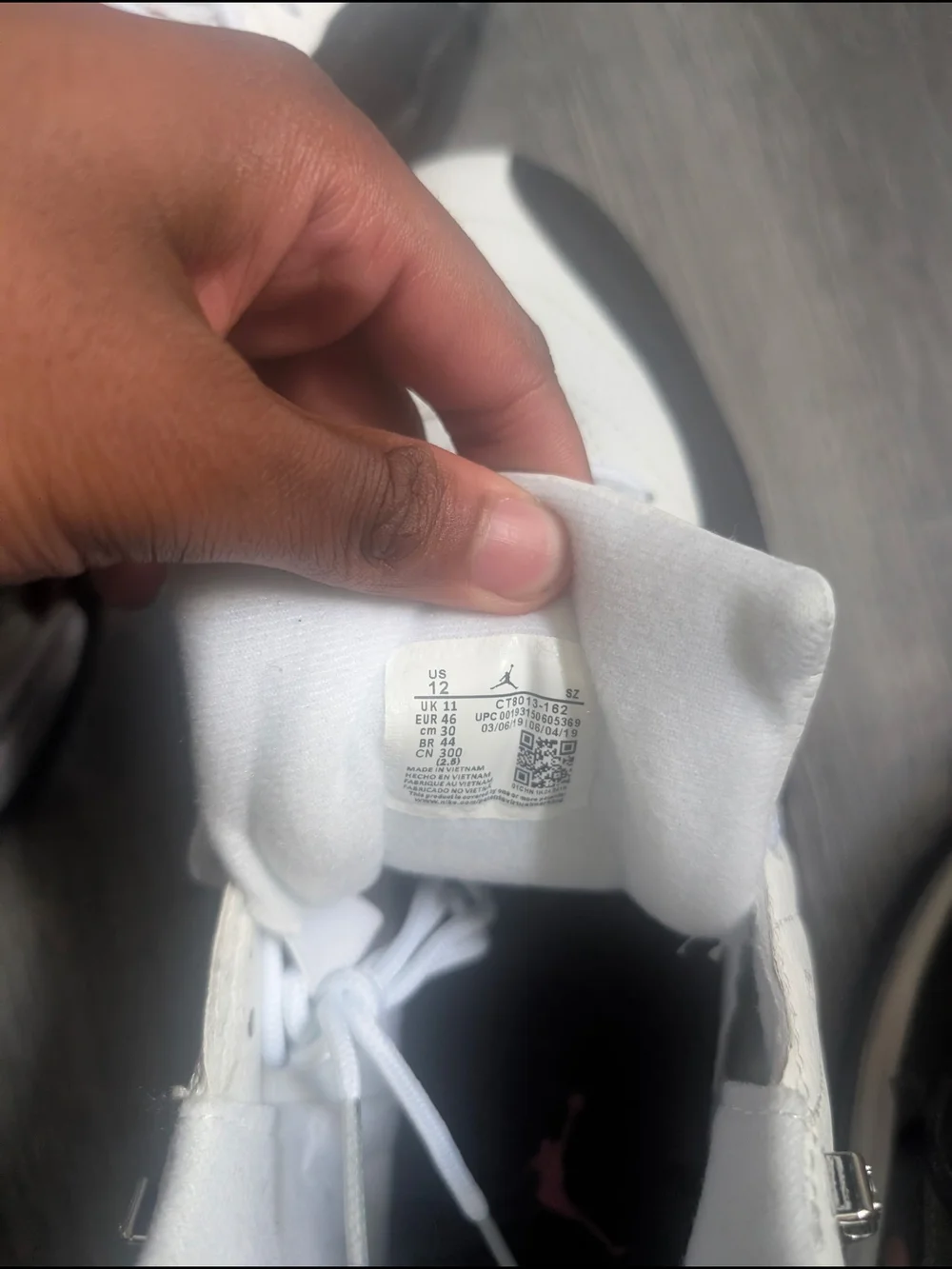 Jordan Men’s White Sneakers with Black Panels and Red Jumpman